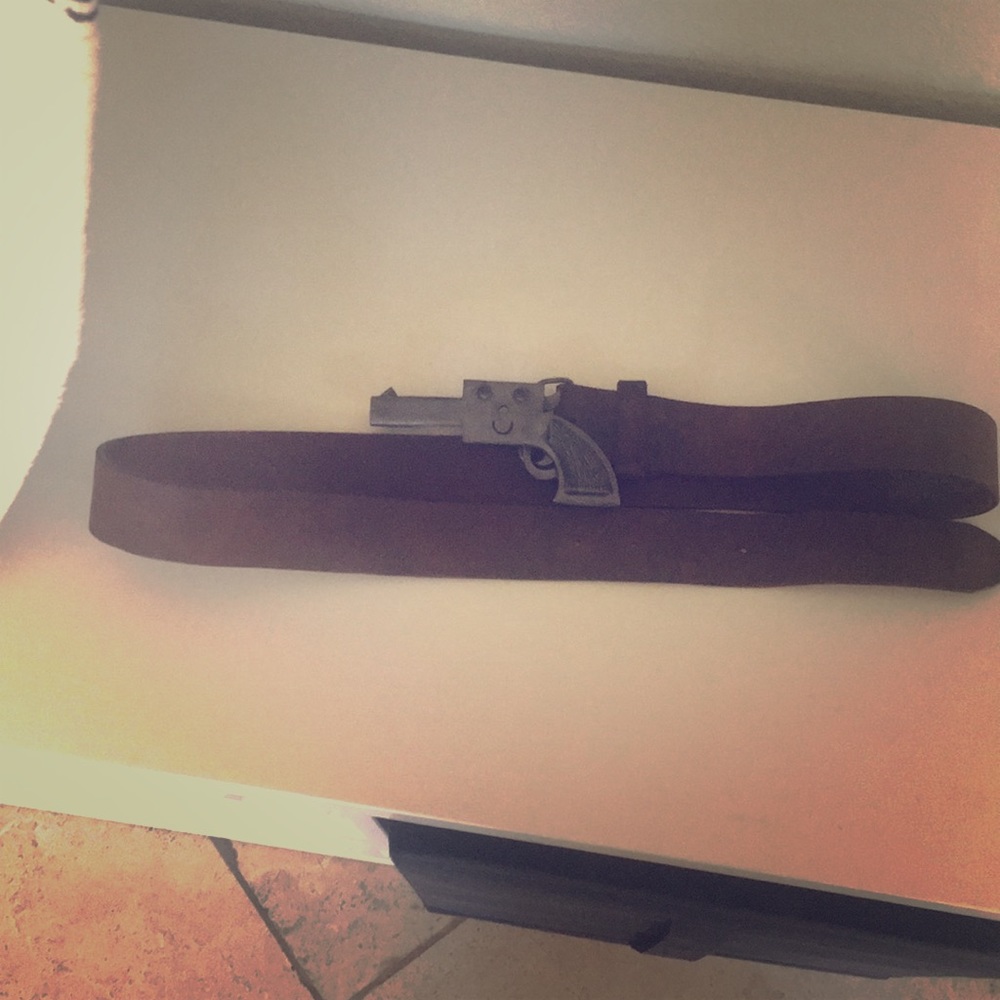 Leather belt with pistol buckle
